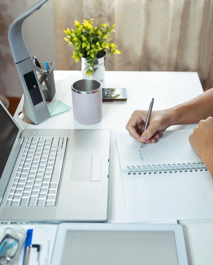 association professional writing down a data checklist